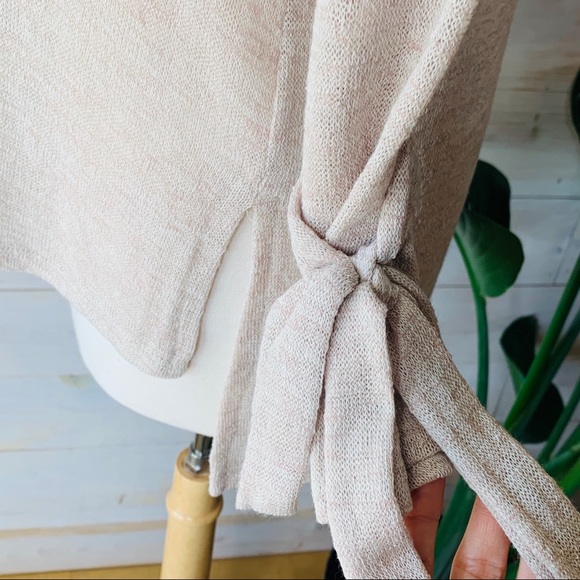 SOLD! Light Cream Colored Soft Knit Top with Cute Detailing Around Wrist - Picture 5 of 6